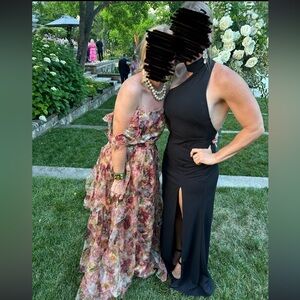 Lulu’s “Keep it Interesting” black Asymmetrical Halter Maci Dress